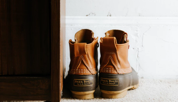 Working boots on the carpet in a bedroom